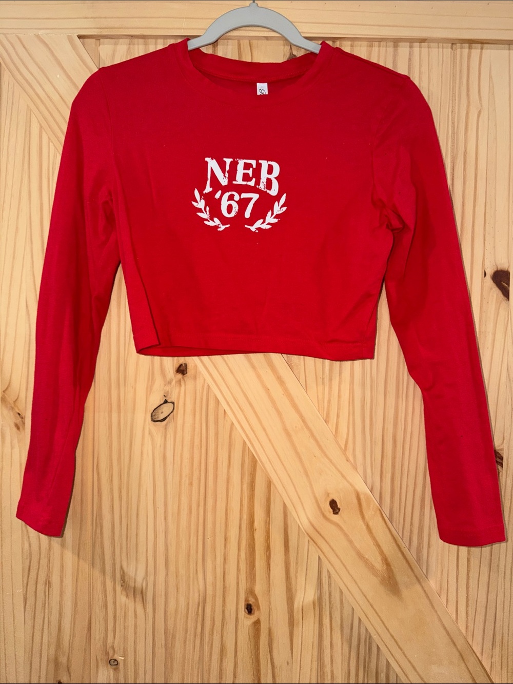 Rosio Red Long-Sleeve Crop Top with White 'NEB 67' Graphic